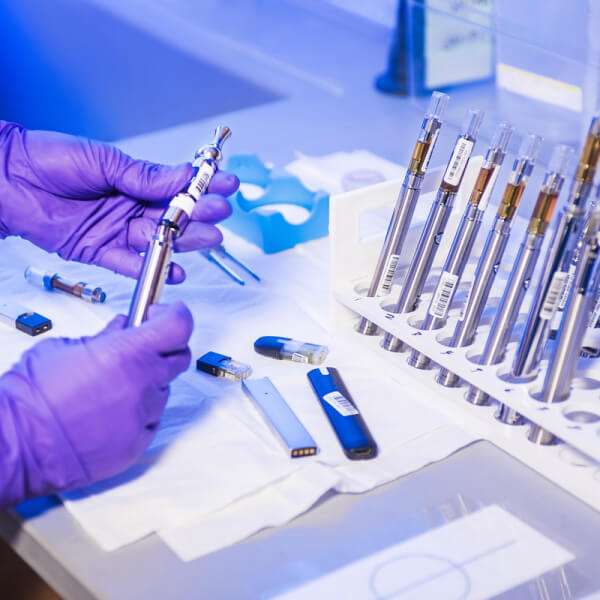 diagnostic lab hand holding tools